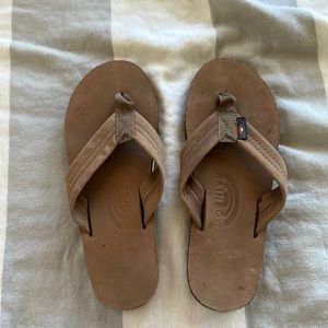 Brand new rainbows just slightly marked from being in a bin with other shoes